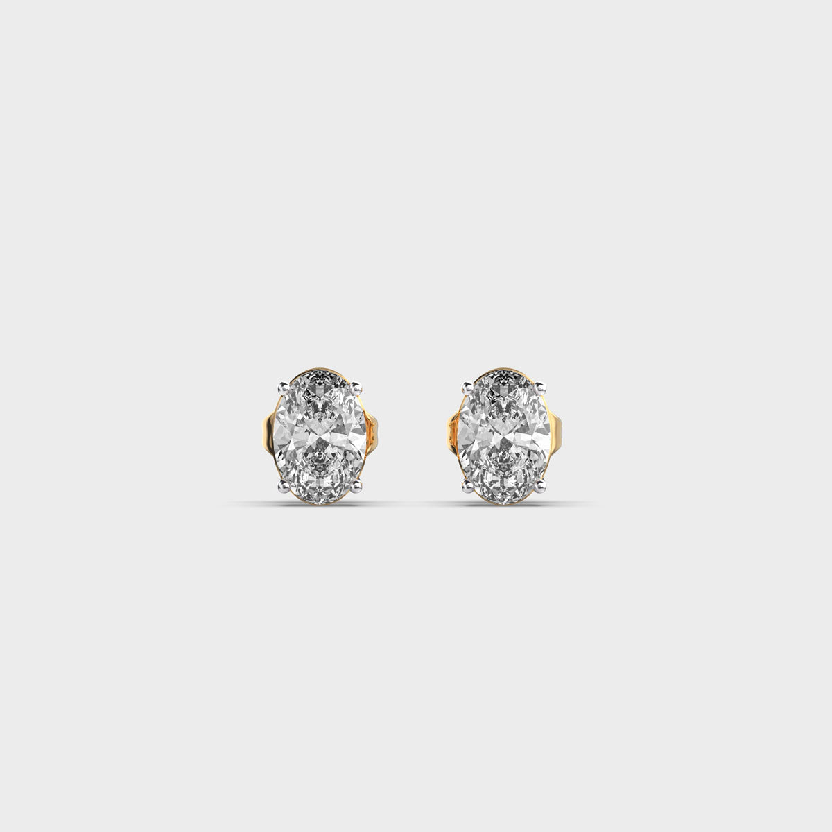 oval diamond 4-prong ear studs