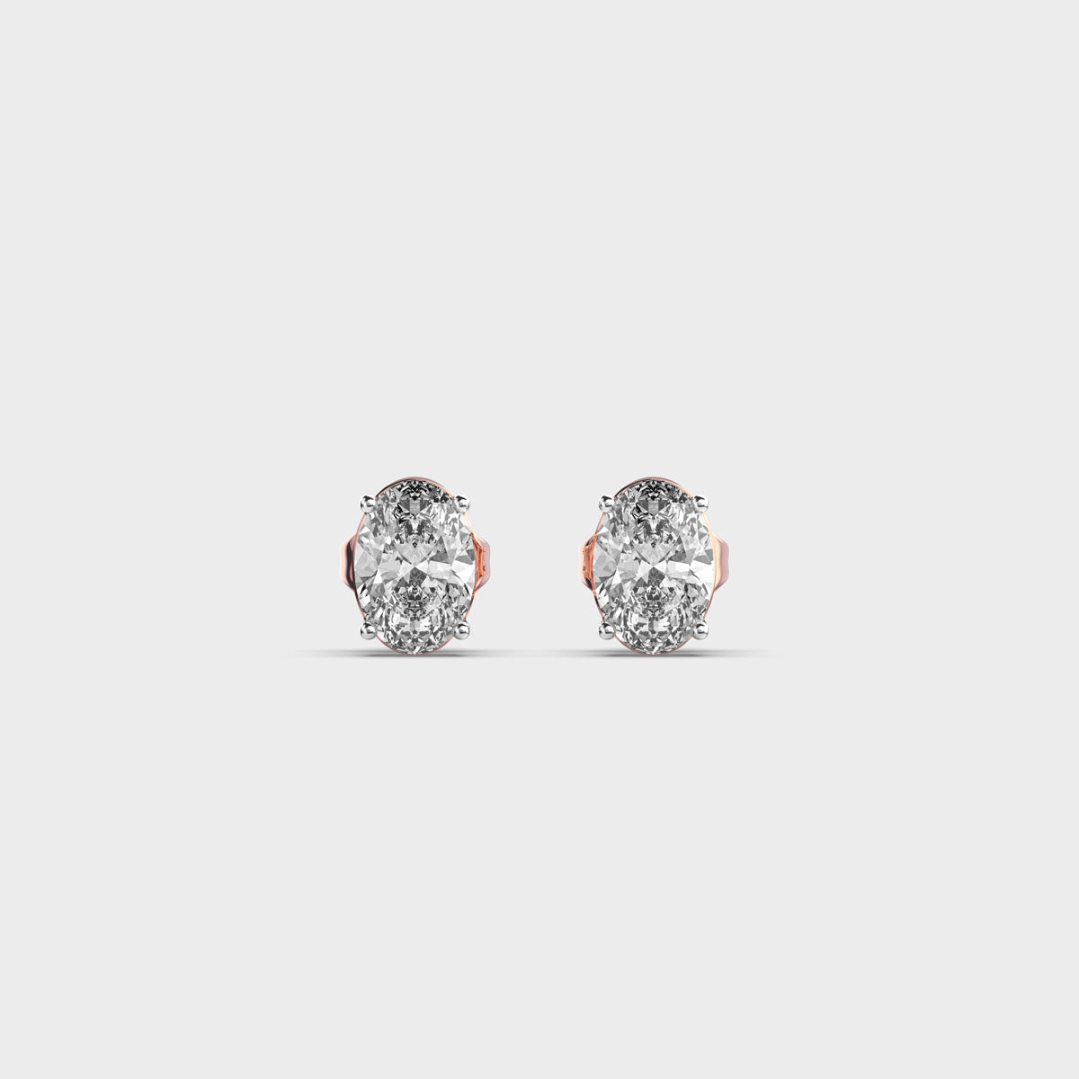 oval diamond 4-prong ear studs