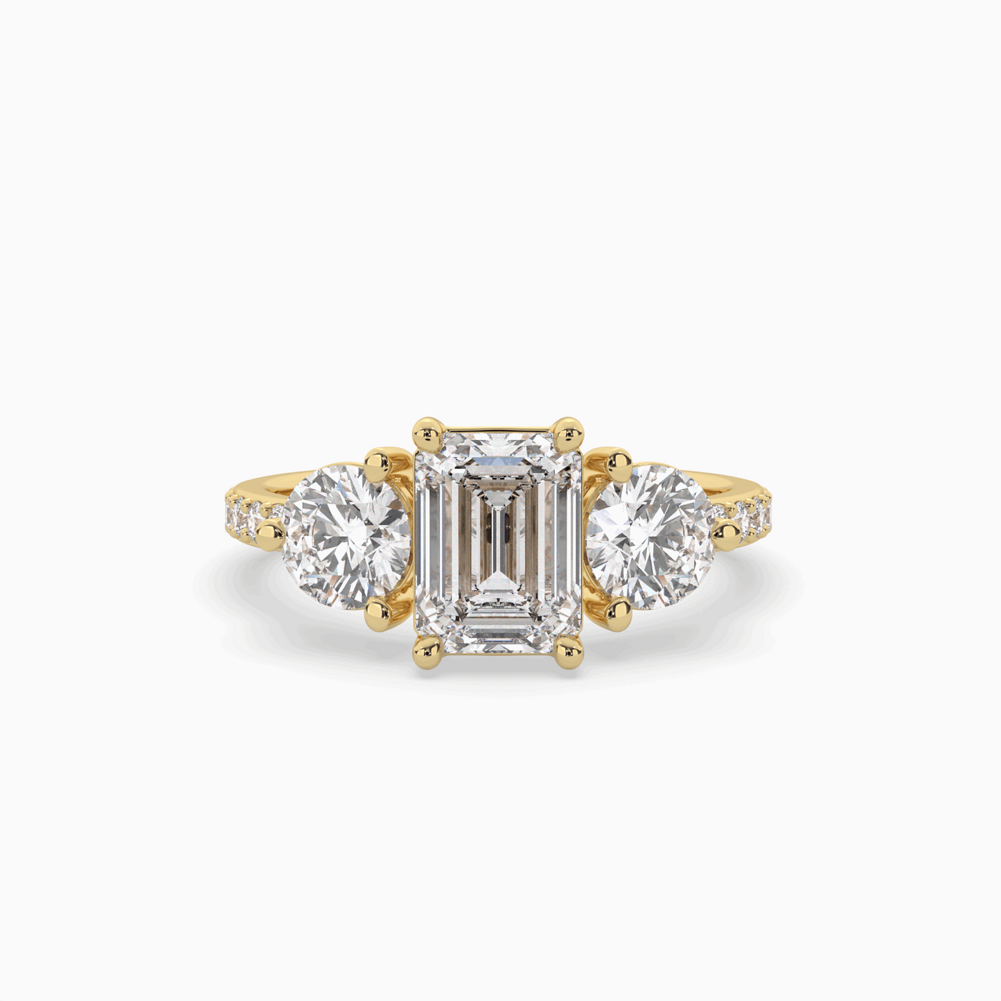 lumina three stone emerald engagement ring