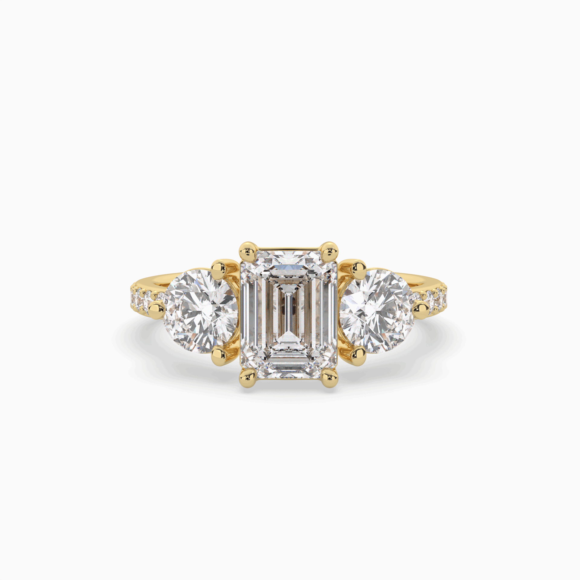 Lumina Three Stone Emerald Engagement Ring