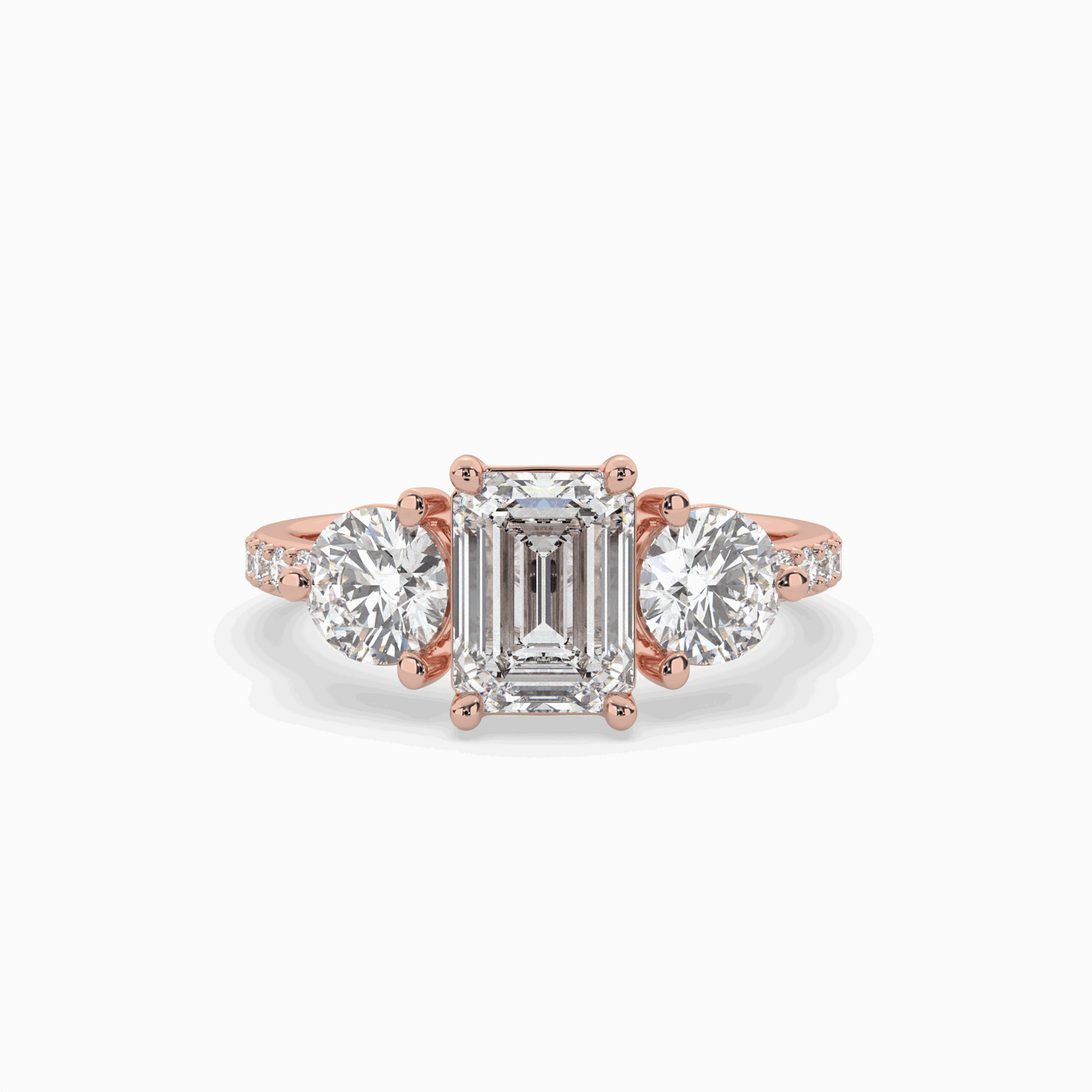 lumina three stone emerald engagement ring