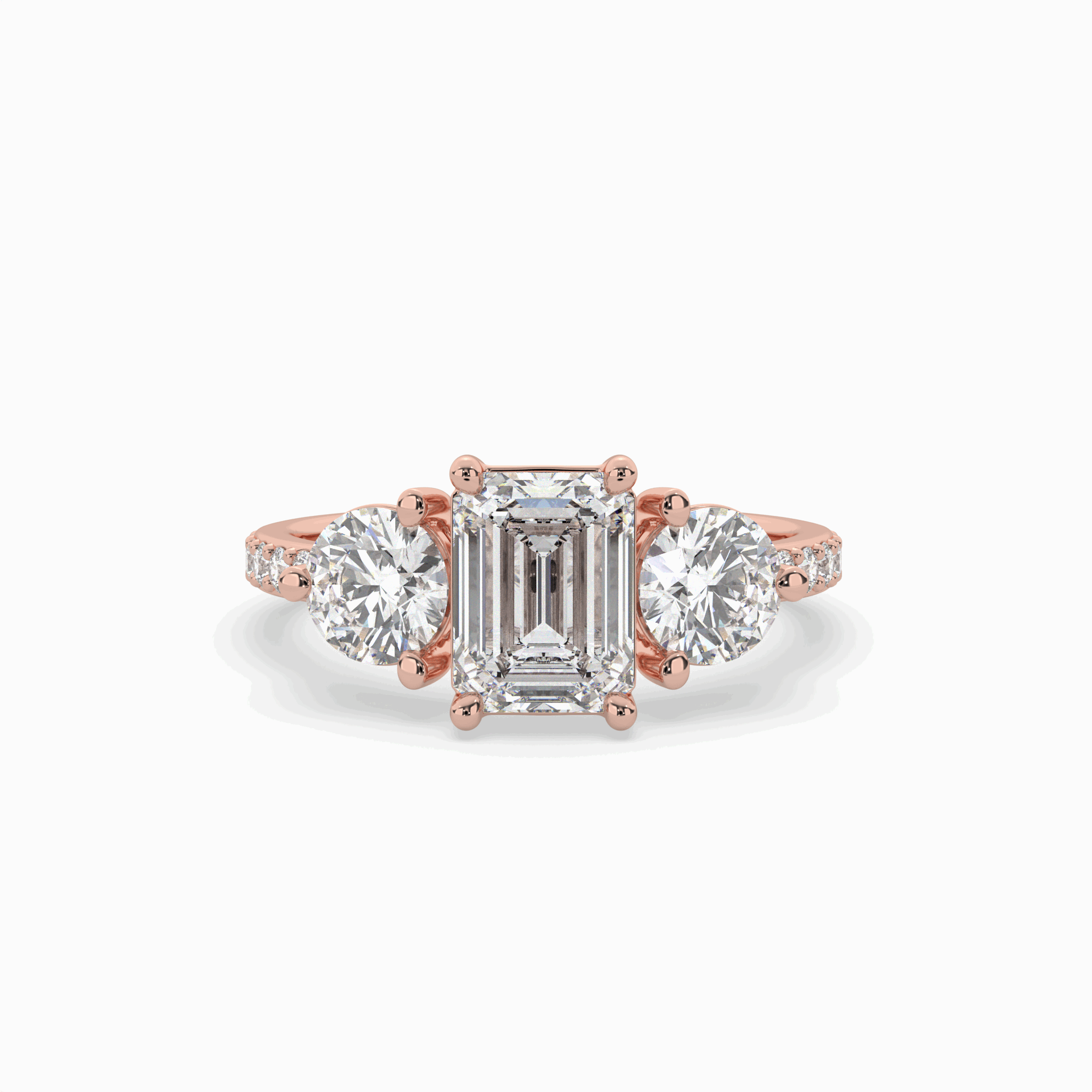 Lumina Three Stone Emerald Engagement Ring