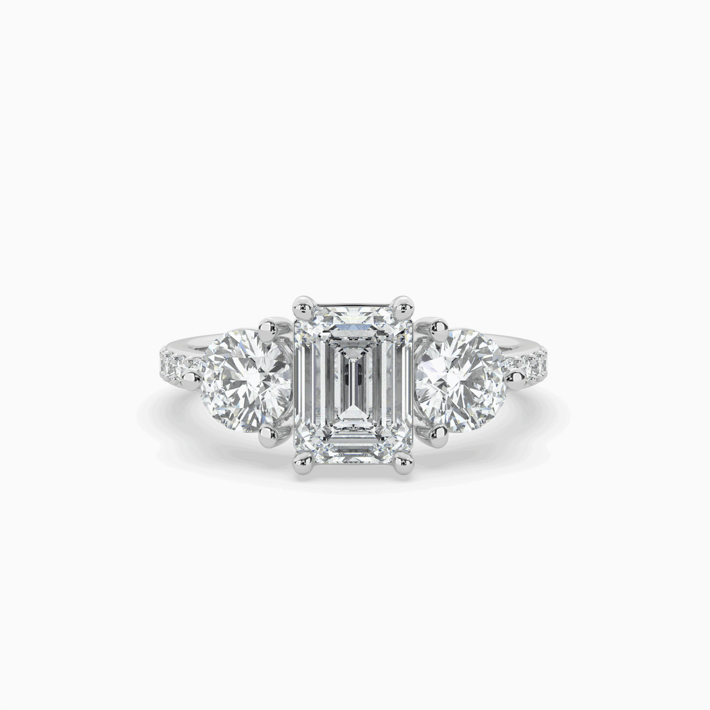 lumina three stone emerald engagement ring