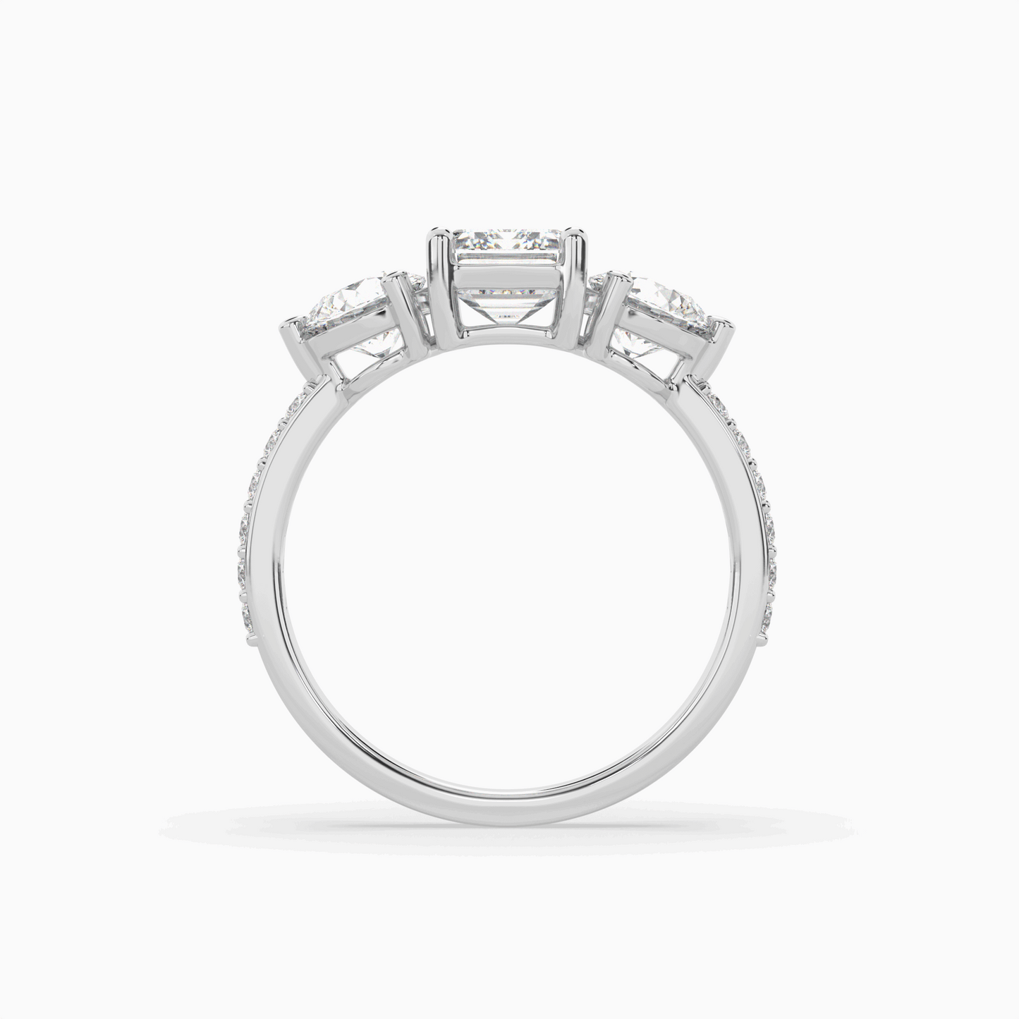 lumina three stone emerald engagement ring