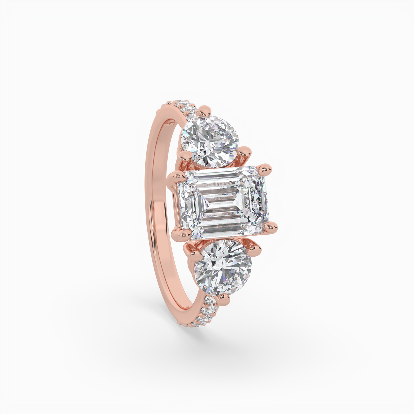 lumina three stone emerald engagement ring