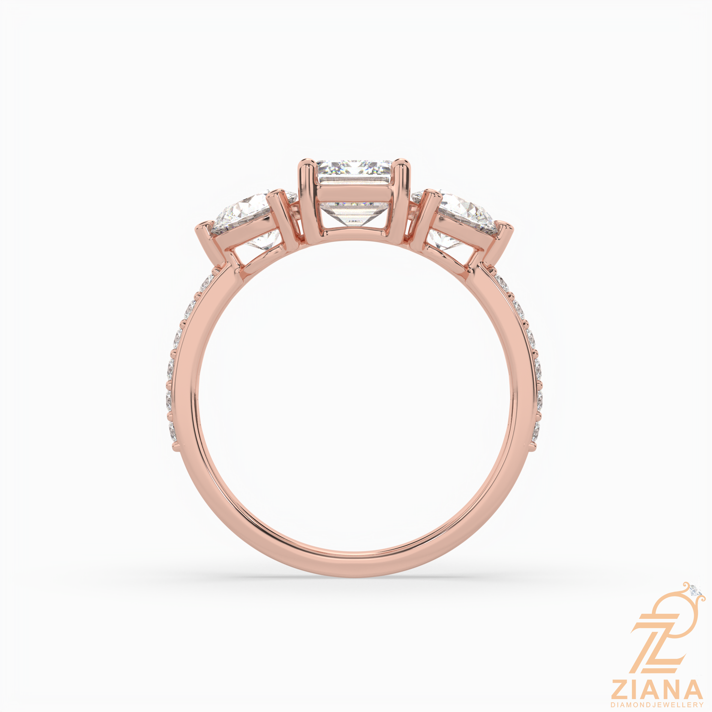 emerald cut three stone diamond engagement ring