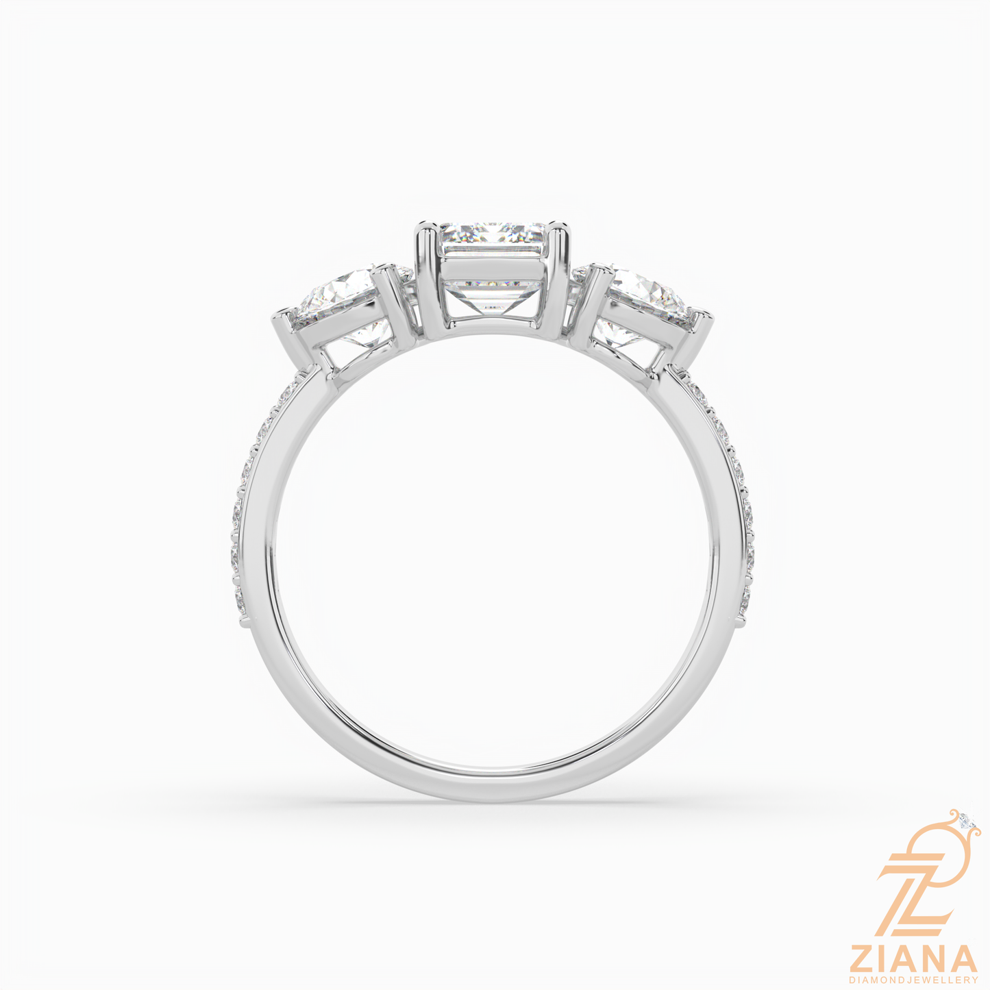 emerald cut three stone diamond engagement ring