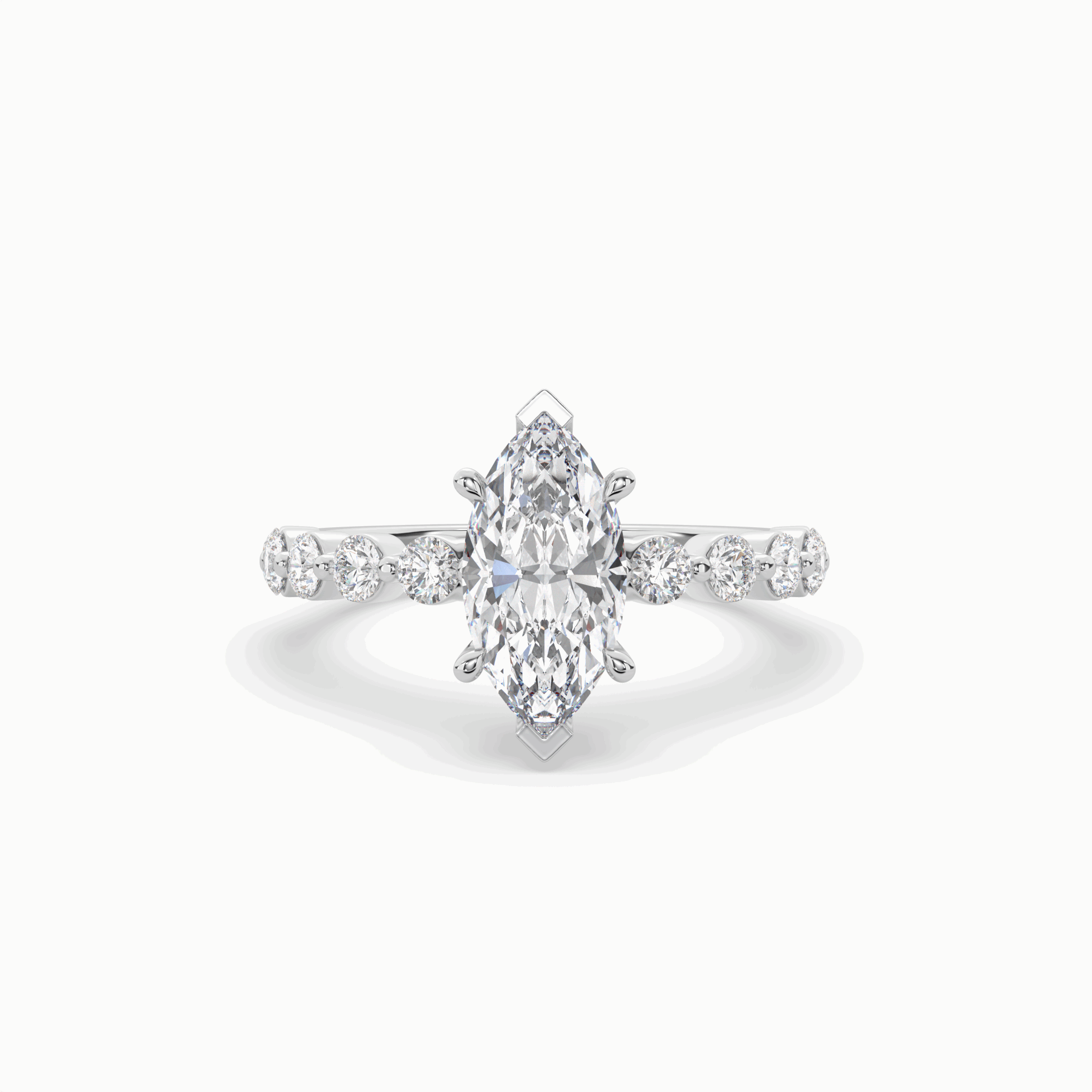 Marquise diamond Centre and bezel set diamond band engagement ring