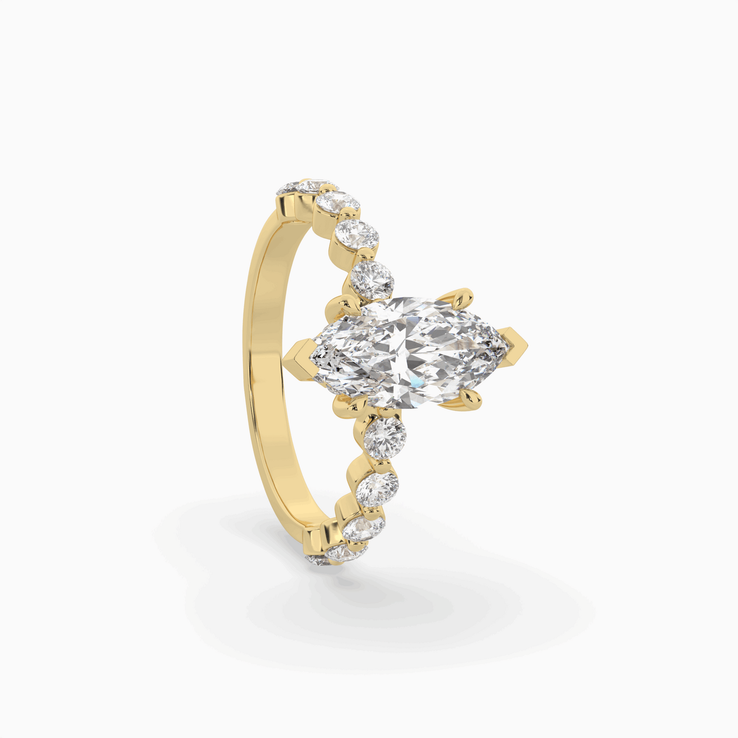marquise diamond centre and bezel set diamond band engagement ring