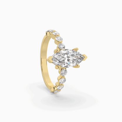 Marquise diamond Centre and bezel set diamond band engagement ring