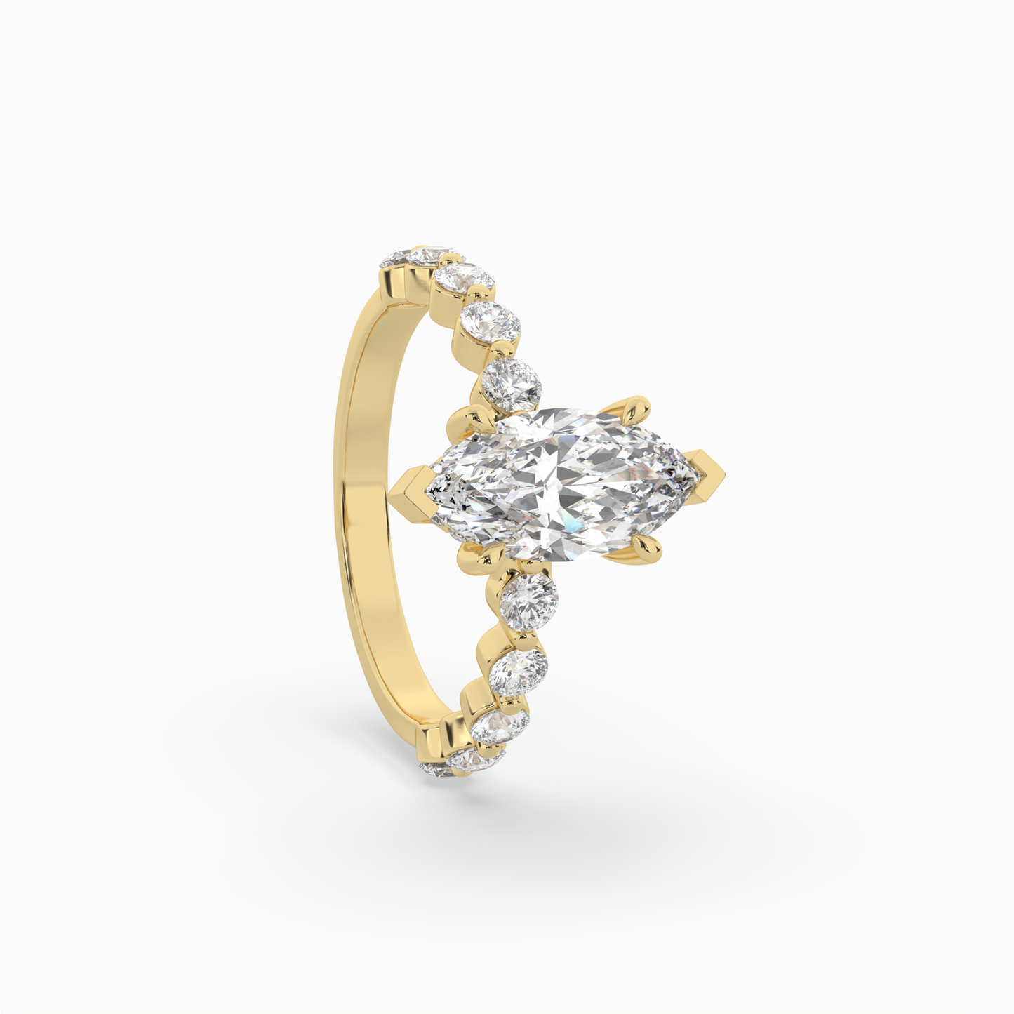 marquise diamond centre and bezel set diamond band engagement ring