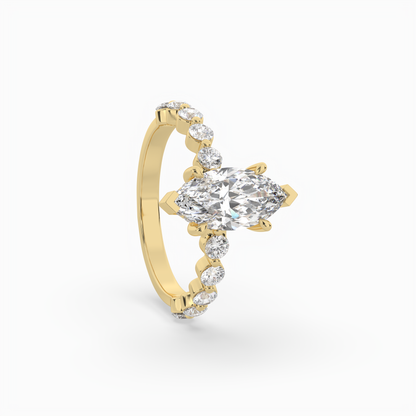 Marquise diamond Centre and bezel set diamond band engagement ring