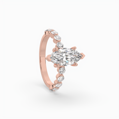 Marquise diamond Centre and bezel set diamond band engagement ring