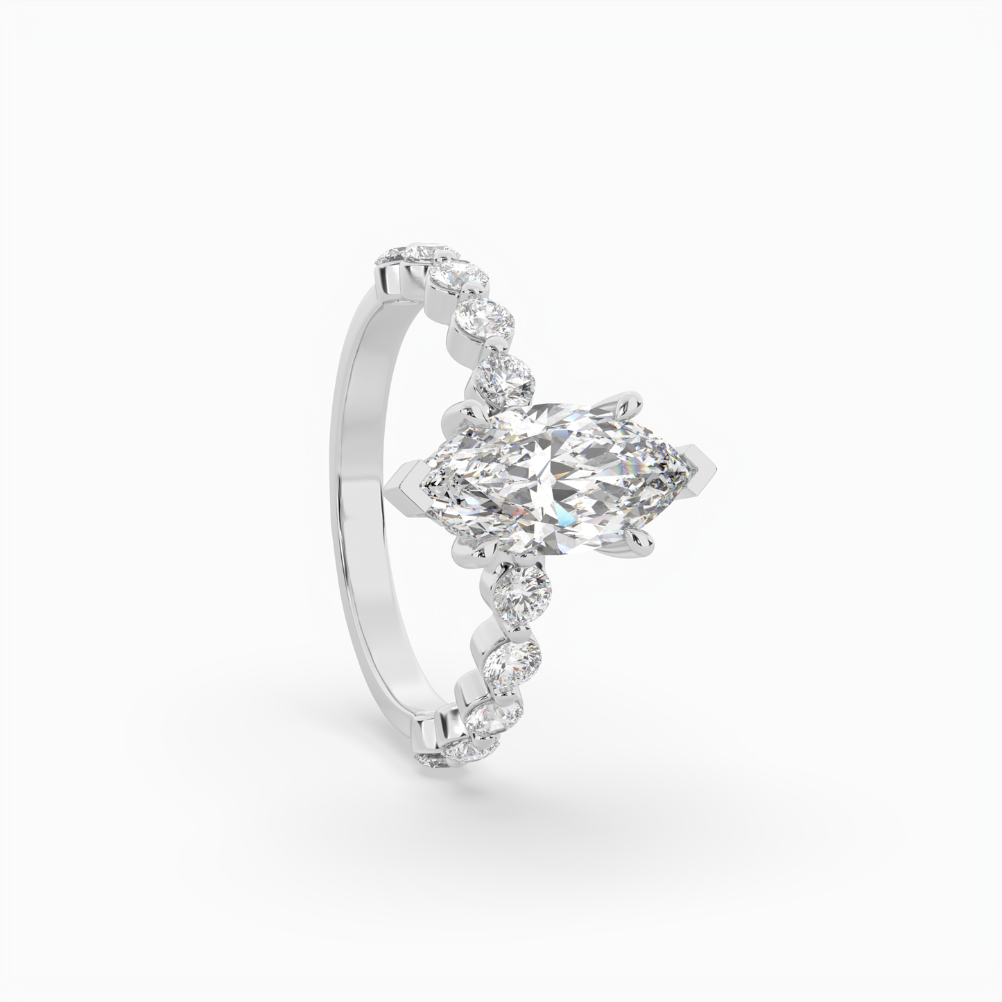 marquise diamond centre and bezel set diamond band engagement ring