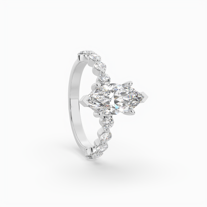 Marquise diamond Centre and bezel set diamond band engagement ring