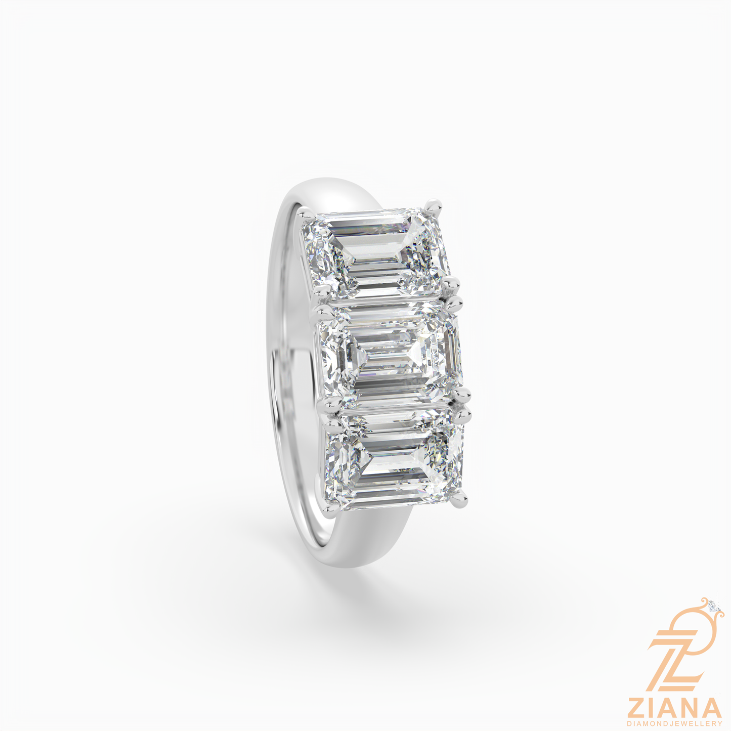 three stone emerald cut diamond engagement ring