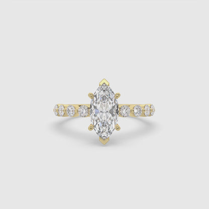 Marquise diamond Centre and bezel set diamond band engagement ring